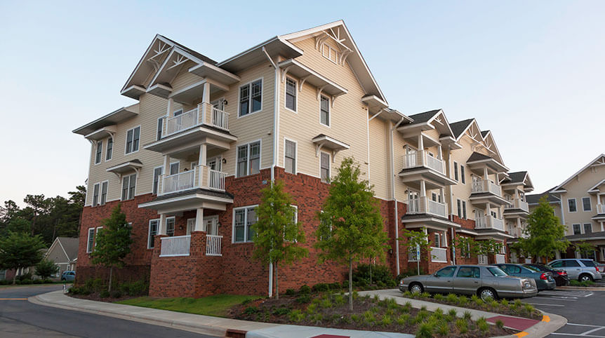 Exterior view of the Penick Village Woodlands apartments.